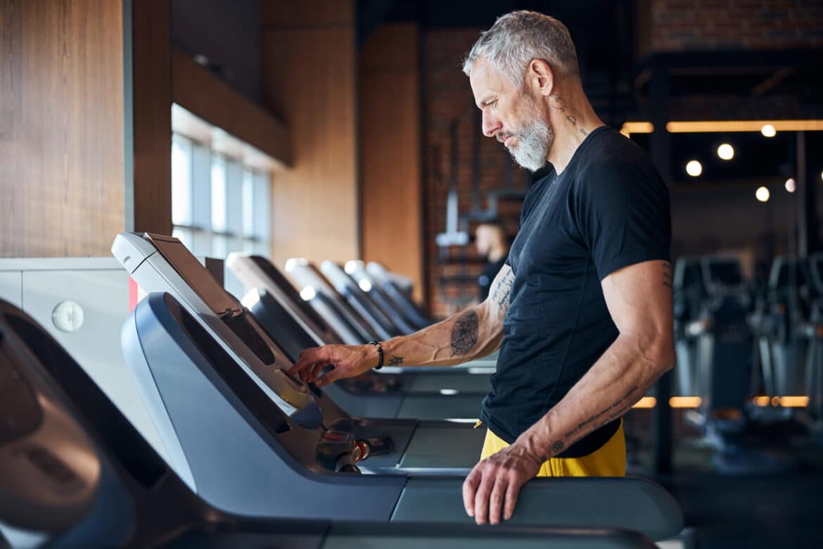 Active man on a treadmill.